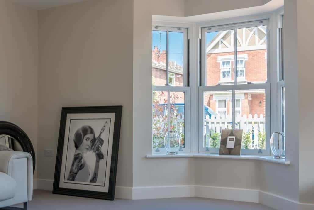 Roseview uPVC sliding sash window tilted open, Windows Etc Essex